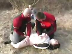 2 Creepy guys violently attacked this couple while they were having sex outdoor. They tied up the guy and let him watch while they together brutally rape his girlfriend.